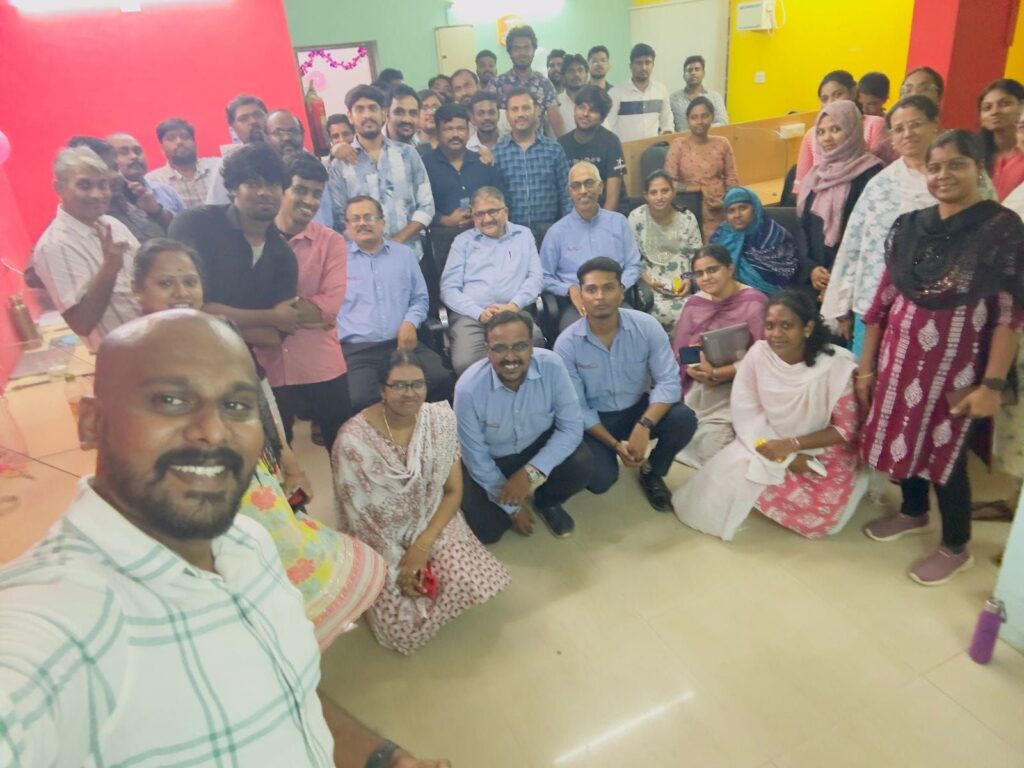A vibrant scene of employees engaging in team-building activities, socializing, and working together, capturing the lively and inclusive culture at MaintWiz Technology CMMS.