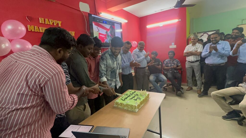 Employees enjoying collaborative work sessions and recreational activities, reflecting the dynamic and supportive environment at MaintWiz Technology CMMS.